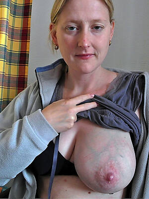 hot mature wife unveils her tits